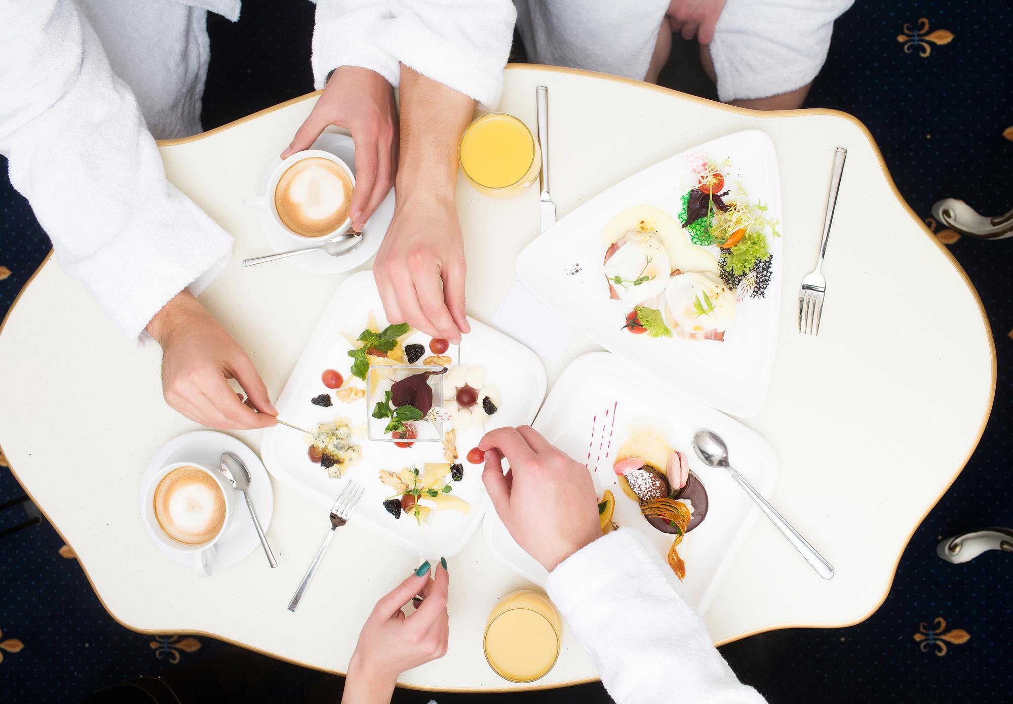 Students tasting a plated dish